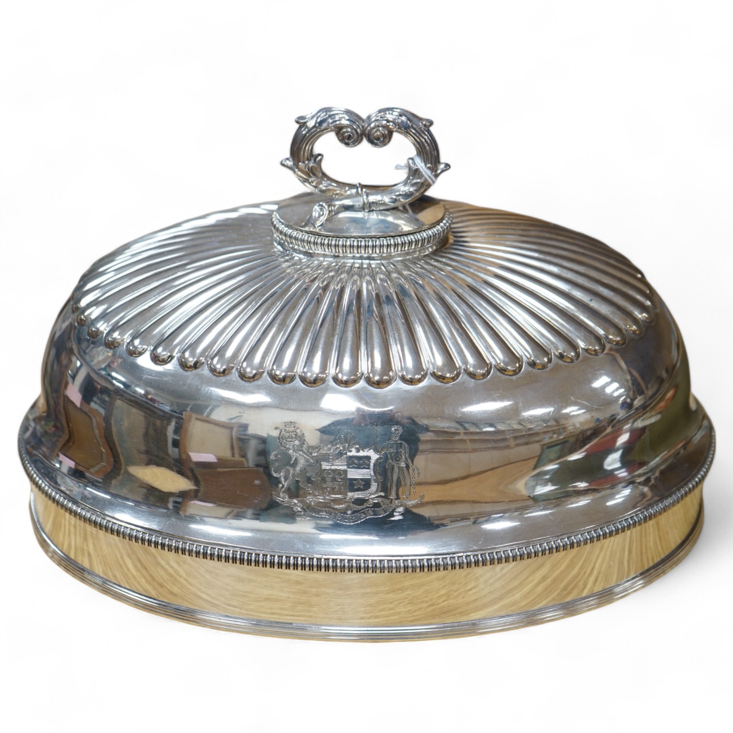 A 19th century Old Sheffield plate oval meat dish cover, with handle, 32.5cm long. Condition- good